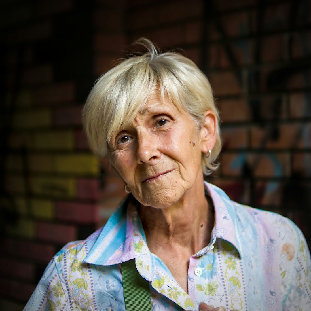 Studio portrait of the editor-in-chief, a woman in her forties