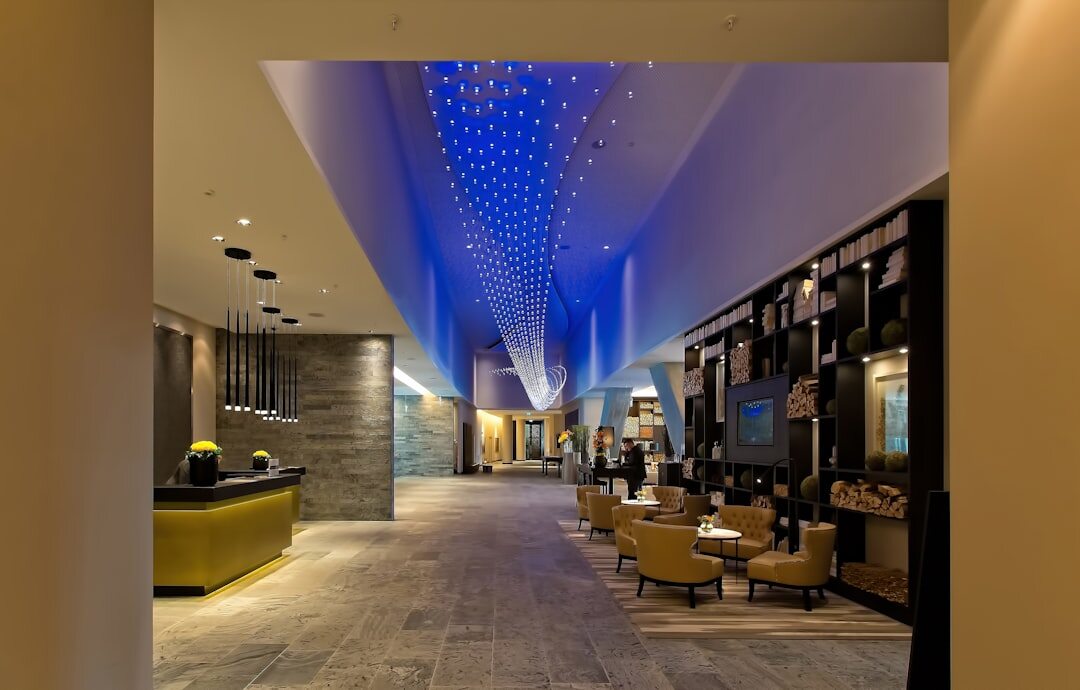 Reception area with framed magazine covers on the wall